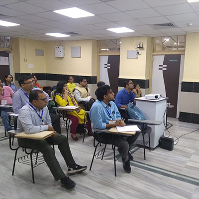 Scientists attending a seminar presentation at NIBMG