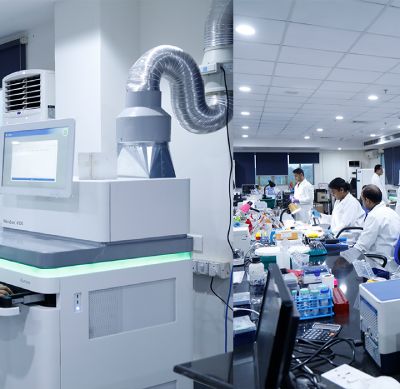 Researchers working with sequencing instruments in an NIBMG core facility